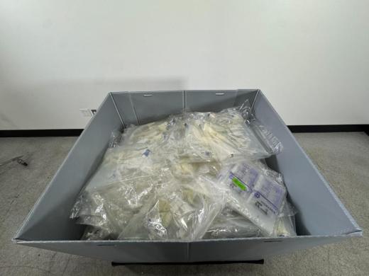 Assorted Laboratory Consumables Including Sterile Gloves and Packaged Tubing Sets-cover