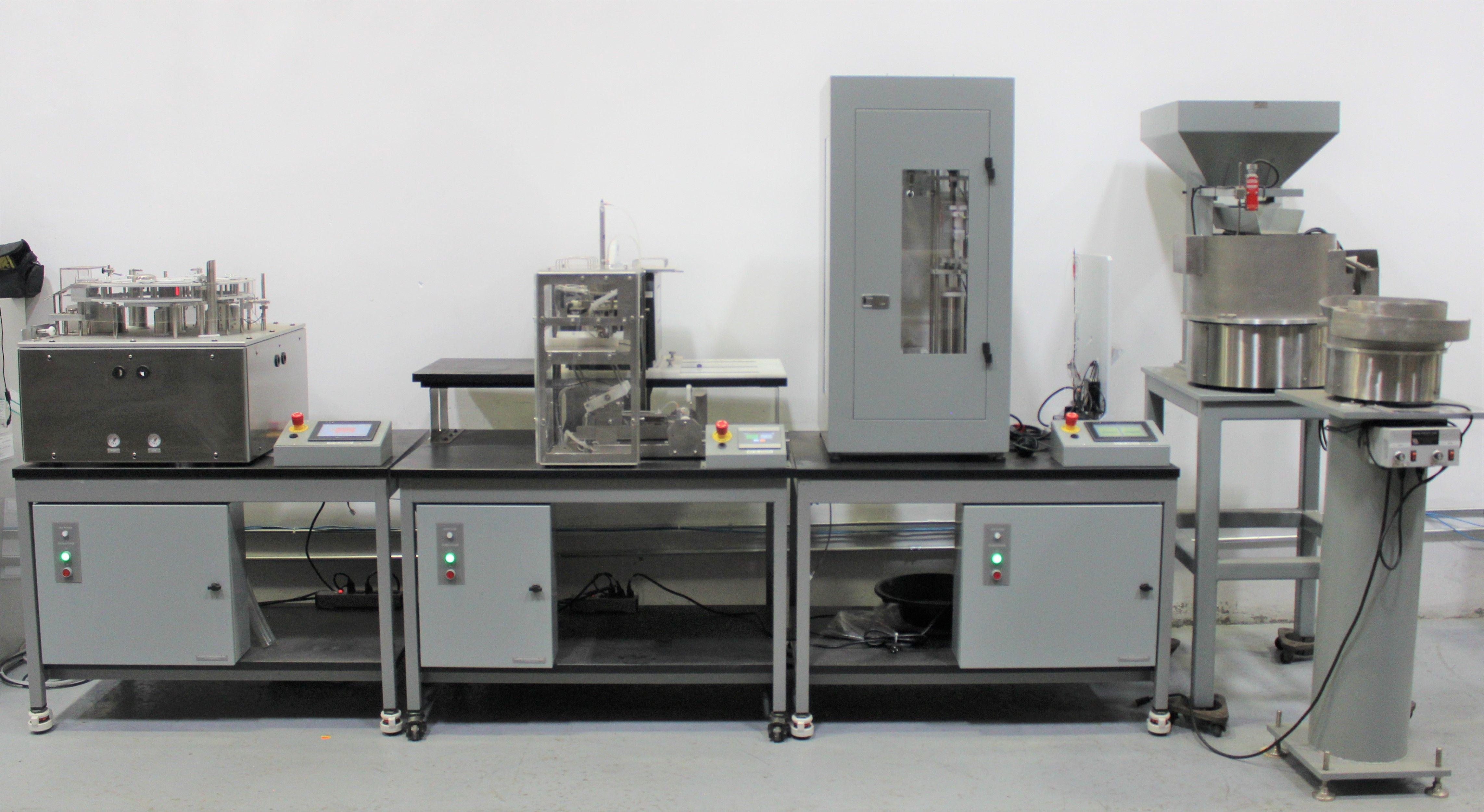 Landry Engineering Filling Station with Vibratory Feeders for 3mL Syringes and Caps Model 3500