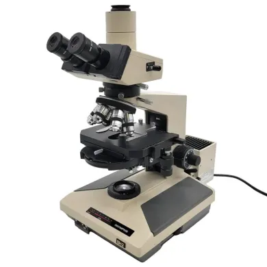 Olympus BH-2 Compound Microscope with DIC, Phase Contrast, Trinocular Head, and 100W Halogen Illumination