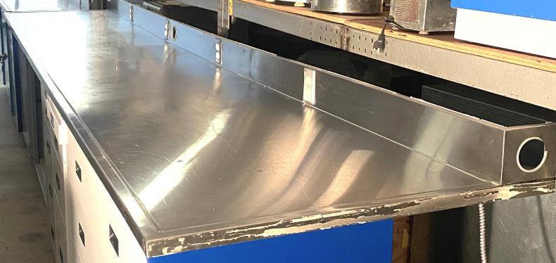 Stainless Steel Dished Worksurface with Electrical Outlets and Backsplash (14-ft)-cover