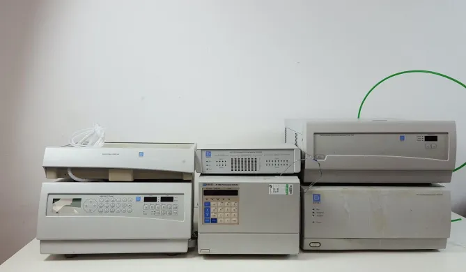 Dionex HPLC System with PDA-100, RF 2000, TCC-100, UCI-100, and P680A LPG-4 Pump