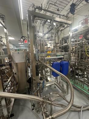 Alfa Laval Astepo grande Automated Liquid Filling Machine with Integrated Roller Conveyor-cover