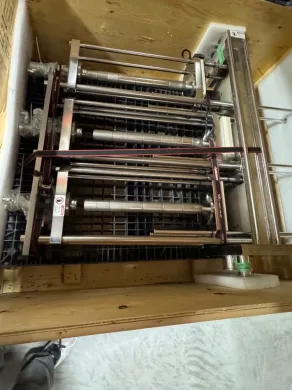 Stack Clamping Device with Adjustable Rods and Clamps for Secure Sample Holding