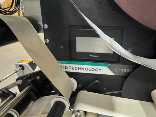 ID Technology ST1000 Automated Label Applicator with ProMach 32D Head-cover