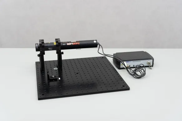Thorlabs HRS 015 Stabilized HeNe Laser with Power Supply and Optical Aluminum Mounting Plate MB4545/M